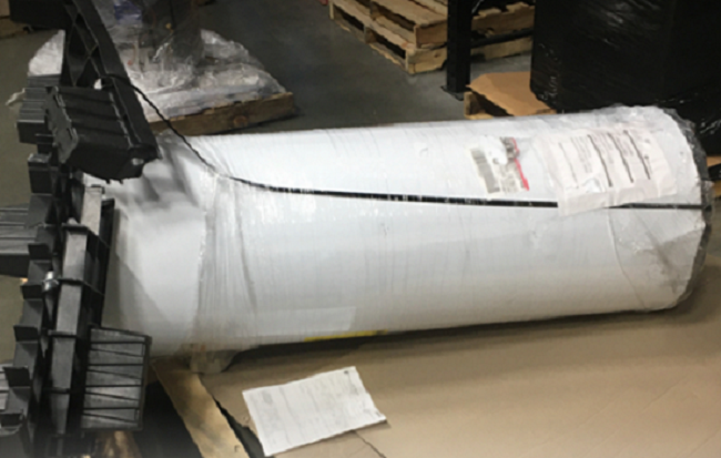 This water heater collapsed in transit because of insufficient restraints and padding, leading to additional damage that could compromise an investigation.