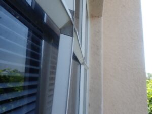 Outward bowing is inconsistent with wind damage but rather is evidence of a manufacturer defect.