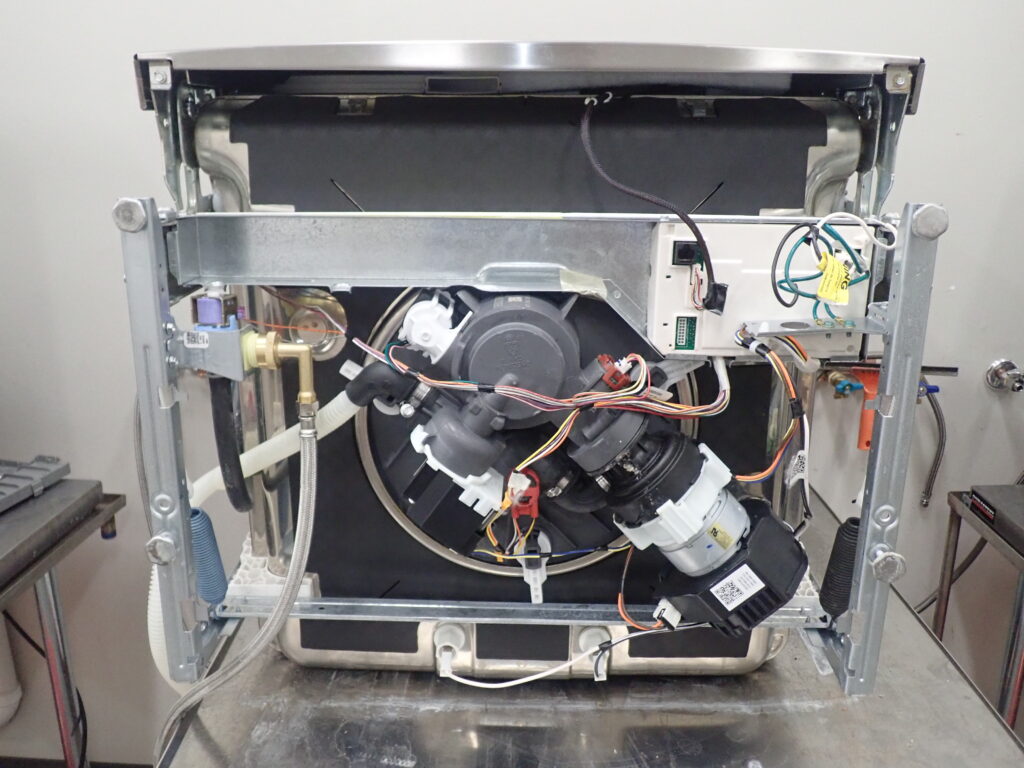 This dishwasher leaked from fractures in the circulation pump’s outlet coupler on the bottom of the dishwasher. A Donan engineer tested it and determined that the cause of the failure was a manufacturer’s defect.