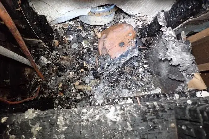 The remains of a plastic gas can were found during a fire investigation at a vacant apartment.
