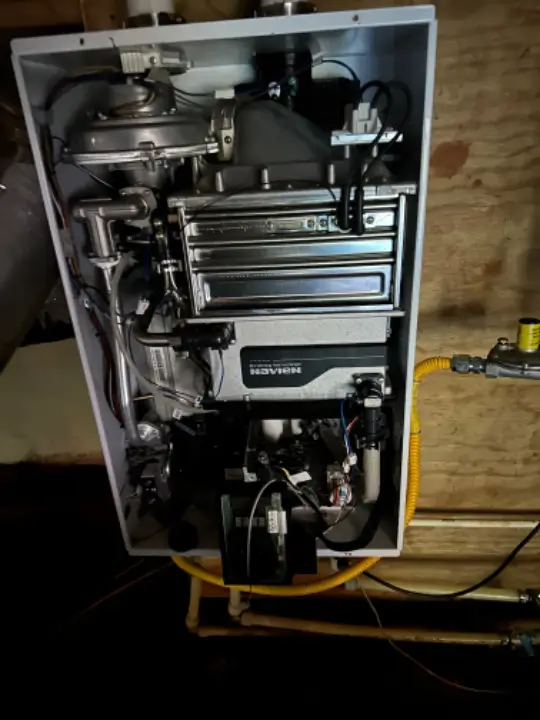 Electrical components, like those in this tankless water heater, are susceptible to high voltage surge damage, but they may also fail because of wear and tear.