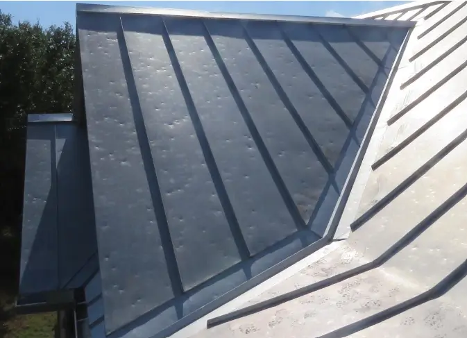 A lot of claimed hail damage to metal is cosmetic, like these indentations that have not compromised watertightness. An expert assessment can help ensure fair and accurate claim settlements.