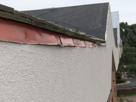 Improperly installed flashing at vulnerable areas, like this roof edging, allows for water intrusion into the roof structure.