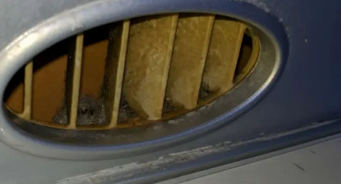 Excessively dusty vents, like the one shown here, could indicate a tanning bed has not been properly maintained and may be vulnerable to accelerated wear and tear.
