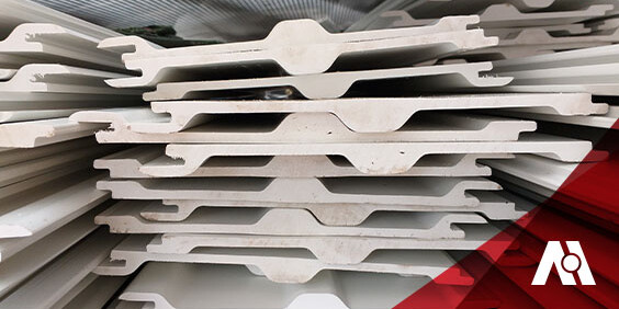 A stack of white plastic sheets