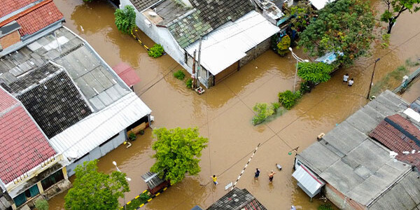 Overhead image of flooded homes in a small town
