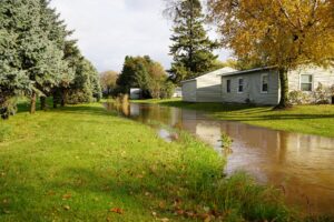 A residential street flooded with water