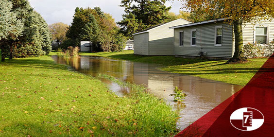 A residential street flooded with water
