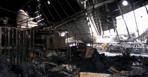 Burned remains of a factory after an industrial fire